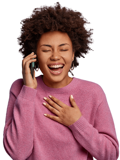 Laughing woman using phone